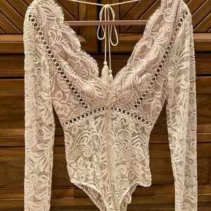 Showpo. White lace bodysuit